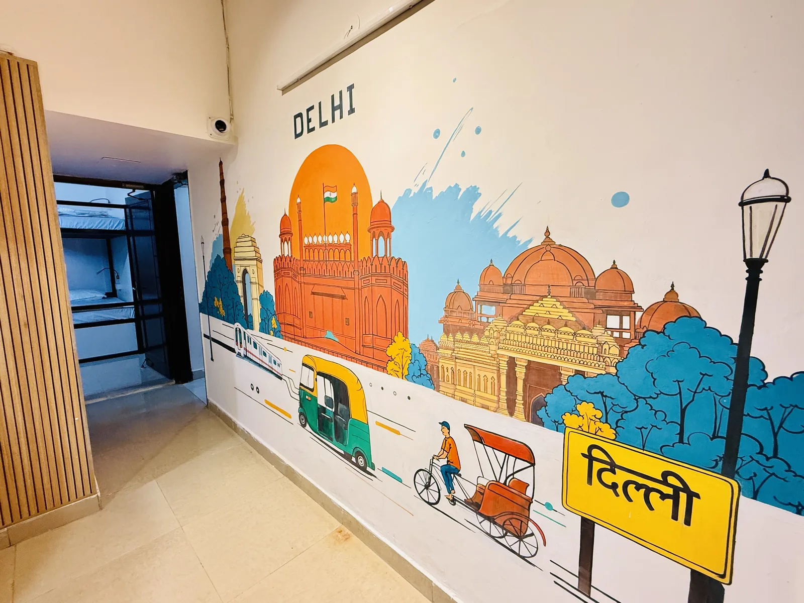 Colourful Delhi landmark mural inside HOSHTEL99 Delhi